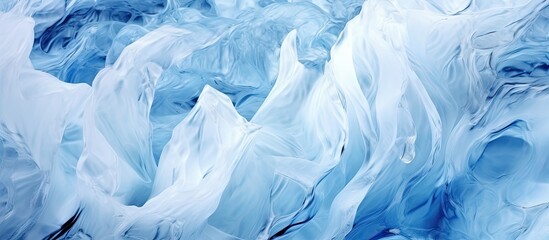 The abstract pattern on the white ice surface creates a stunning background resembling the texture of water in nature