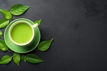 Wall Mural - Healthy Light Green Tea Cup with Fresh Green Leaves