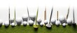 Golf balls and golf clubs on green grass.Golf equipment in the top view.Sports that people around the world play during the holidays for health