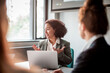 © Marko Geber - Businesswoman giving presentation in conference room