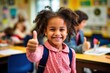 © Diamanddog 76 - Six year old girl, afro american, thumbs up, school girl