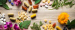Nutritional Therapy Spread: Assorted Supplements Amongst Flowers and Herbs