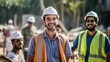 Happy of team construction worker working at construction site. Man smiling with workers in white construction industry