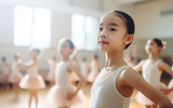 Asian 6 years old ballerina in dance studio - ballet and dancer concept