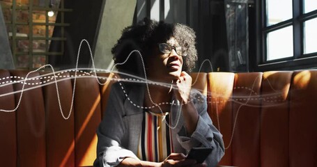 Poster - Animation of connections over african american woman in cafe