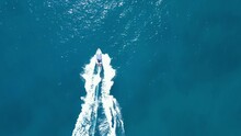 Drone Shot Of A Person Doing Water Ski With Motorboat