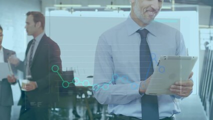 Poster - Animation of statistical data processing against caucasian businessman using tablet at office