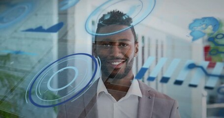 Poster - Animation of graphs, globe and loading circles over smiling african american man standing in office