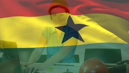 Poster - Animation of ghana flag waving over smiling caucasian woman wearing helmet working on computer