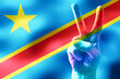 Democratic Republic of the Congo - two fingers showing peace sign and national flag