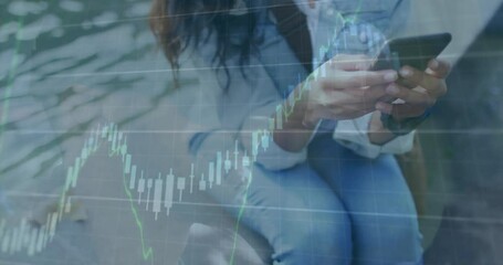 Poster - Animation of multiple graphs and changing numbers, midsection of caucasian woman using cellphone