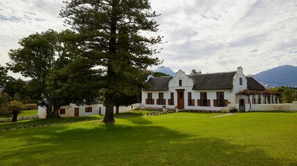 Wall Mural - Closeup of Historical buildings in the church street in Tulbagh in South Africa under the blue sky