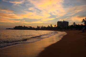 Wall Mural - Light pink and purple light above the sea during the sunset, Sri Lanka