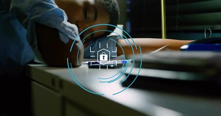 Poster - Animation of circle with lock icon over african american businesswoman sleeping on desk in office
