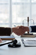 Lawyers shake hands with business people to seal a deal with partner lawyers or a lawyer discussing contract agreements, handshake concepts, agreements.