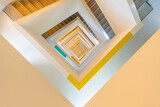 Fototapeta Tęcza - Looking down at a colorful staircase