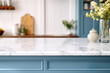 © oksa_studio - Closeup of white marble countertop in modern blue kitchen with vase of flowers. High quality photo