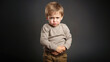 © Julia Zarubina - sad little boy holding his stomach, illness, cramps, health, color background, stomach-ache, abdominal, griping, bellyache, tummy-ache, gripes, portrait, ill, child, kid, baby, toddler, son, cry