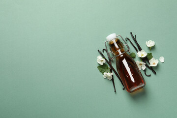 Poster - Vanilla extract in a bottle on a light background