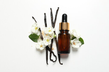 Poster - Vanilla extract in a bottle on a white background