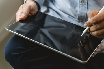 Poster - man hands using tablet working, connecting wifi, and chatting in social networks