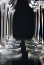 Extreme Close Up Of Empty Wine Glasses Lined Up
