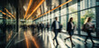 © Bartek - Speed of Business: Blurry Long Exposure Shot of Office Workers in Lobby