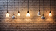 Hanging lamps against white painted brick wall background
