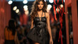 Fashion show, catwalk Event, runway show week. Model in black dress.