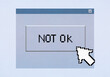 © fStop - Computer cursor hovering over Not OK button