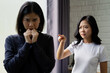 © PBXStudio - Two Asian women fighting or bullying in the office