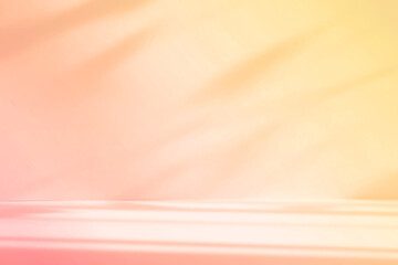 Leinwandbilder - Abstract orange color gradient studio background for product presentation. Empty room with shadows of window and flowers and palm leaves . 3d room with copy space. Summer concert. Blurred backdrop.