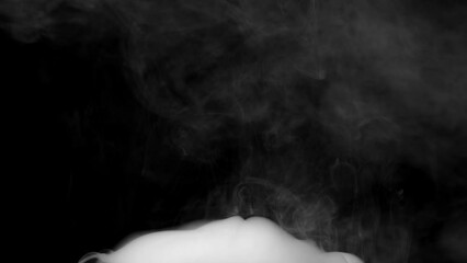 Wall Mural - Abstract white smoke animation on a black background. Smoke, steam, explosion, fire, puff, steady vapors. Realistic smoke cloud from up and button with floating fog. Best for using in composition.