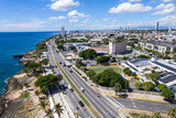 Fototapeta Natura - Beautiful aerial view of the city of Santo Domingo - Dominican Republic with is Parks, buildings, suburbs ,turquoise Caribbean ocean, parks and malecon
