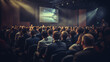 © Synaptic Studio - Rear view of people in audience at a business event in a conference hall