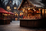 Fototapeta Uliczki - christmas market with cute decorated stalls illuminated with festive lights on evening winter street. cozy atmosphere