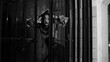 Brunette girl in Halloween style. A woman in prison, a scary scene. Terrible darkness, torn clothes on the girl. Hostage in a cage, depression, suffering, crime. Black Carnival, in the basement.