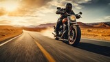 The Open Road Awaits: A biker, clad in black boots and leather jacket, sits confidently on a classic motorcycle by the side of the road, ready for a thrilling journey.