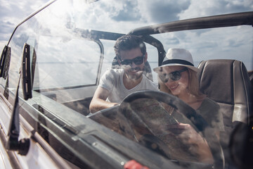 Couple travelling by car