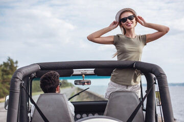 Wall Mural - Couple travelling by car