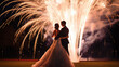 © bmf-foto.de - Silhouettes of a bride and groom in front of a nighttime fireworks display