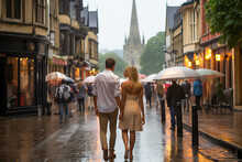 Loving Couple Waling Hand In Hand In Oxford