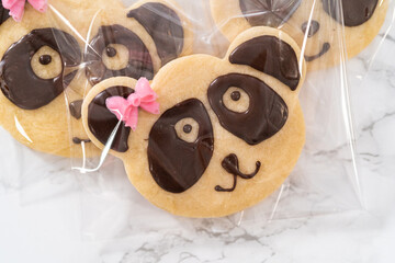 Wall Mural - Panda shaped shortbread cookies with chocolate icing