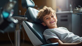 Fototapeta  - A cute brave smiling child is sitting in a dental chair . World Dentist and Dental Hygiene Day
