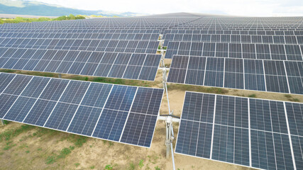 Wall Mural - Utility scale solar farm or pv plant with bifacial modules and trackers