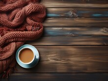Top View Of Coffee And Knitted Scarf On Wooden Table, Winter Background