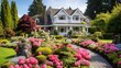 Manicured House and Garden displaying annual and perennial gardens in full bloom.