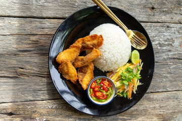 Wall Mural - Crispy Fish and Green Mango Rice Bowl