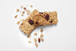 Tasty granola bars on white background, top view