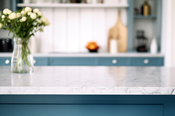 White marble countertop in modern blue kitchen interior with vase of flowers background. High quality photo